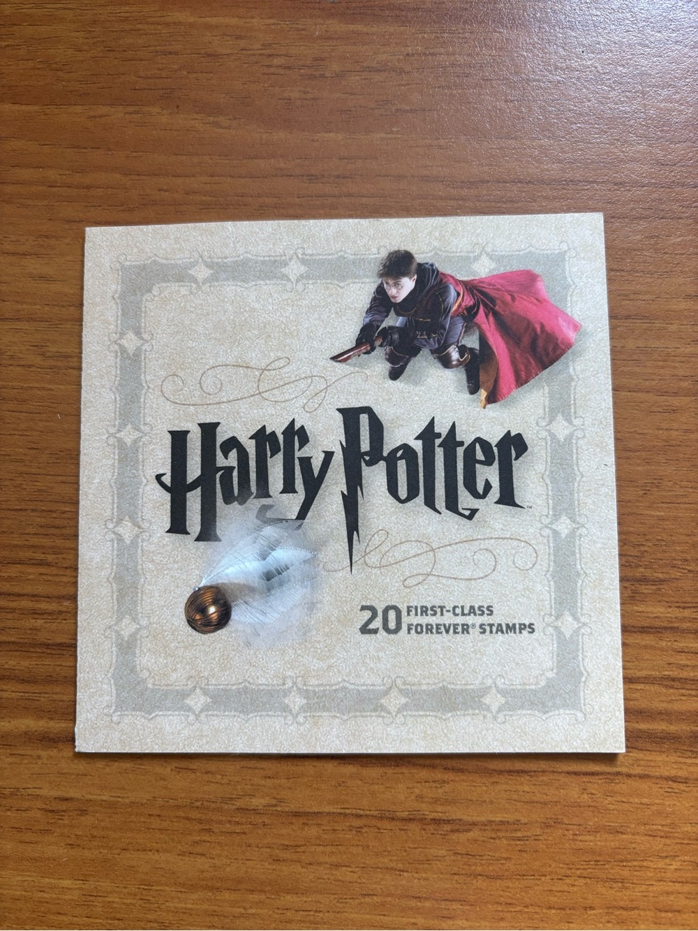 Warner Bros. Harry Potter Stamp Booklet with Red Cloak and Gold Snitch Accents